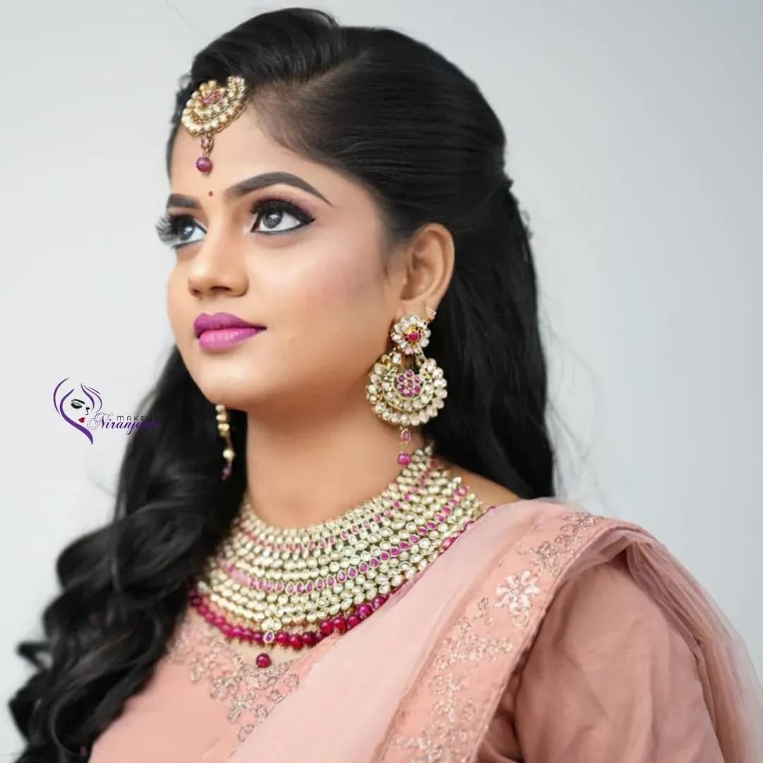 Reception makeup look 7 by Makeup Niranjana, Chennai