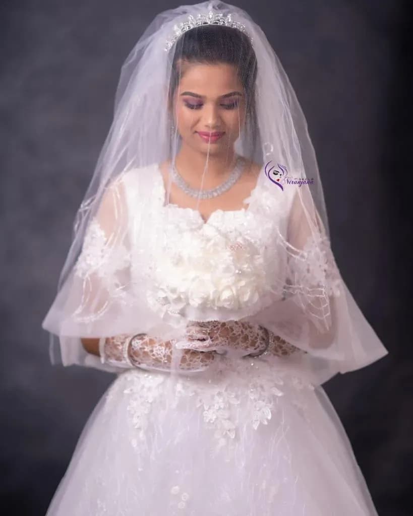Christian wedding makeup look 6 by Makeup Niranjana, Chennai