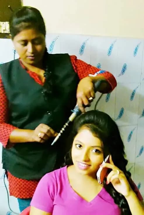 Bridal hairstyle by Makeup Niranjana — jadai-billai and traditional Chennai hair styling