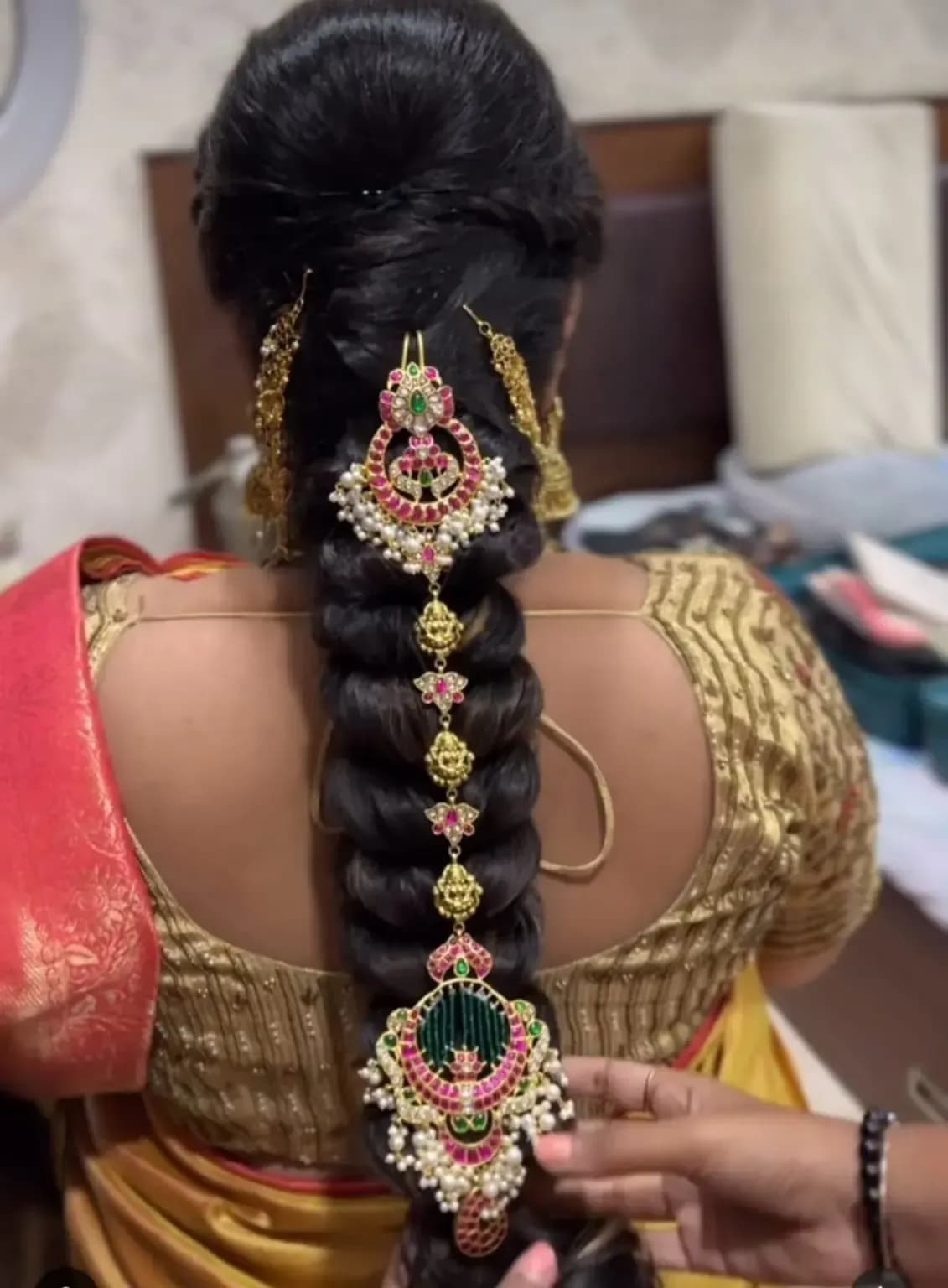 Bridal hairstyle by Makeup Niranjana — jadai-billai and traditional Chennai hair styling