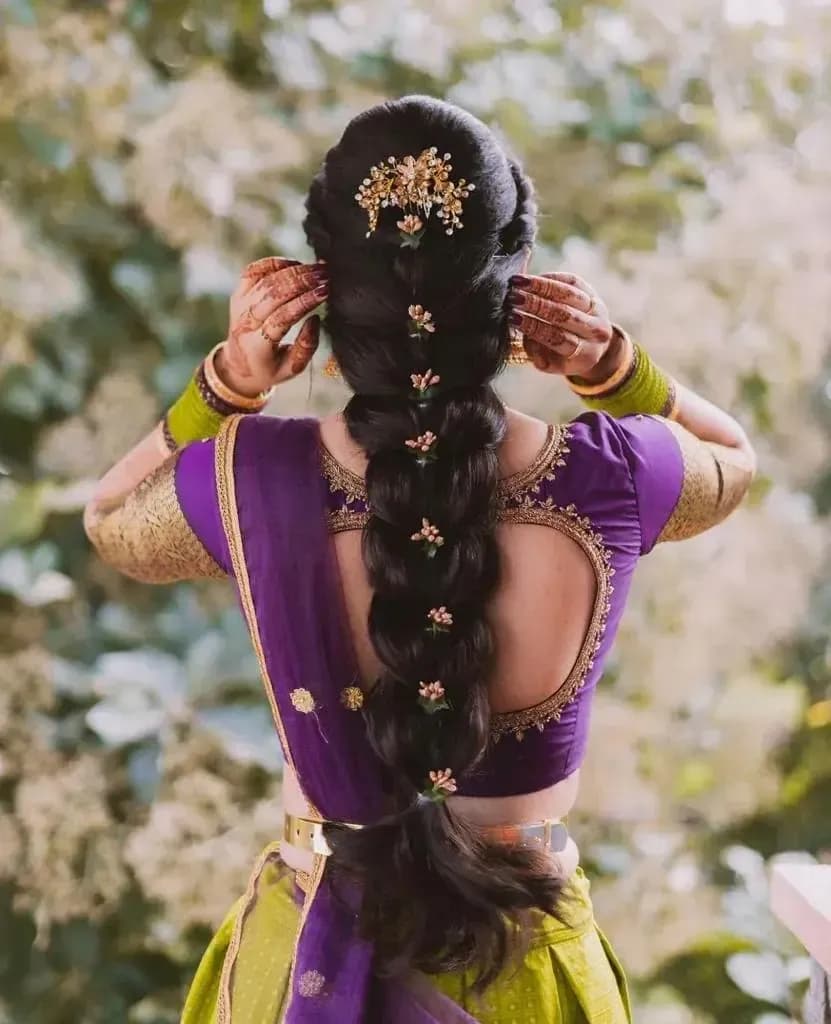 Bridal hairstyle by Makeup Niranjana — jadai-billai and traditional Chennai hair styling