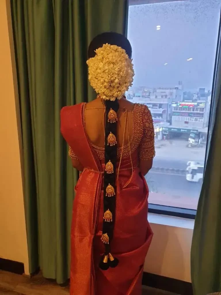 Bridal hairstyle by Makeup Niranjana — jadai-billai and traditional Chennai hair styling